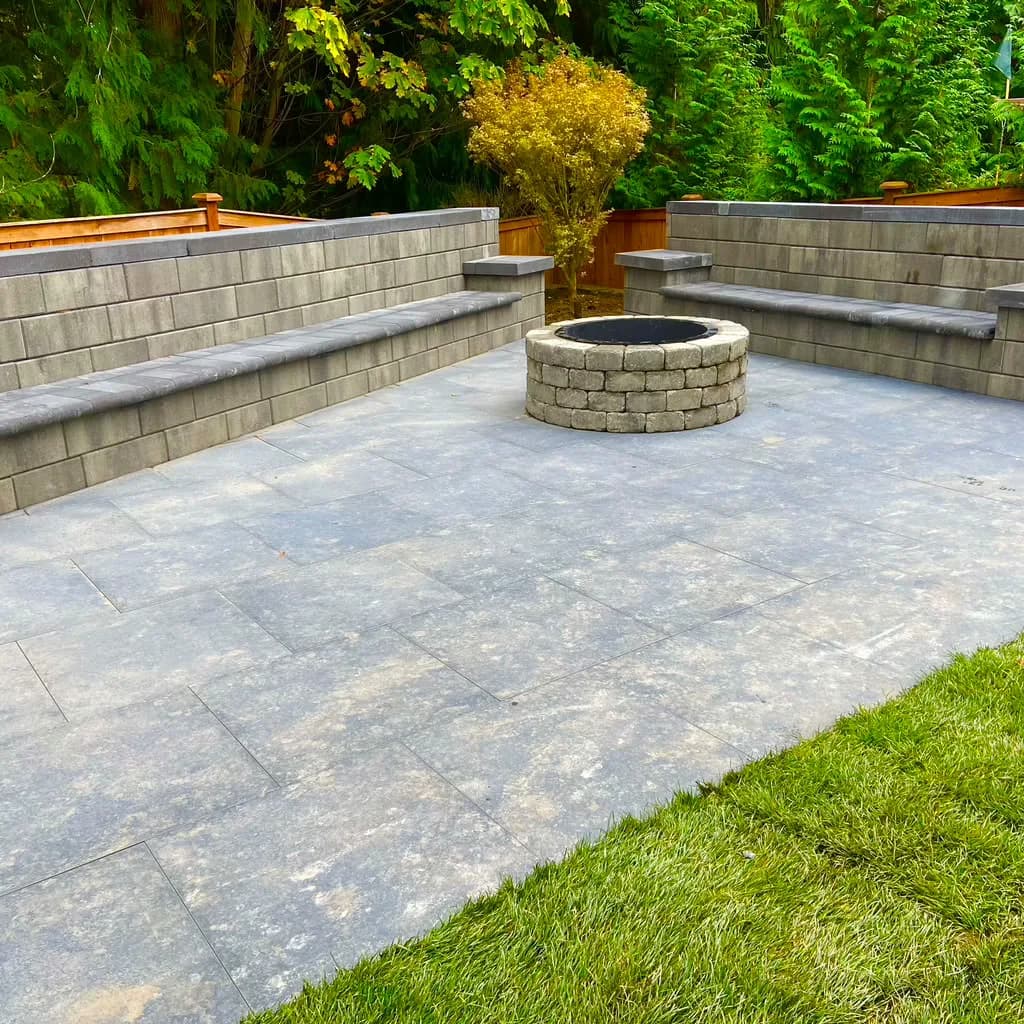 Patio with fire pit and seating walls