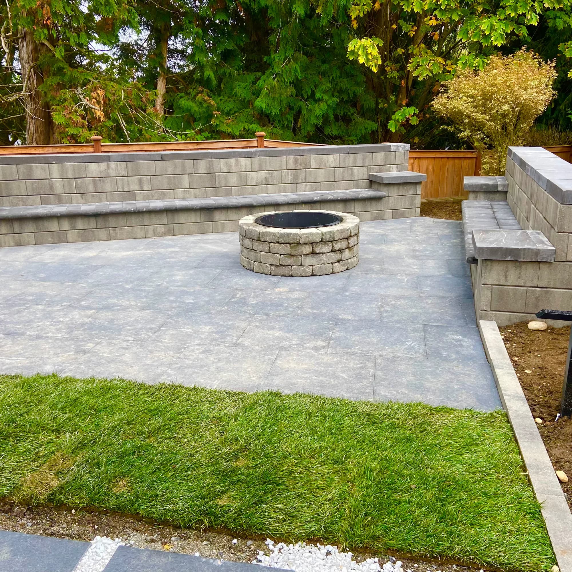 Outdoor patio with stone fire pit